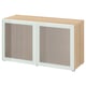 BESTÅ Holzschrank mit Milchglastüren, hellbeige, rechteckig.