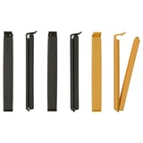 Sechs bunte Dichtungsclips ausgestellt; Drei schwarze und drei goldene, rechteckige Form mit Verriegelungsmechanismus, aus Polypropylen-Kunststoff.