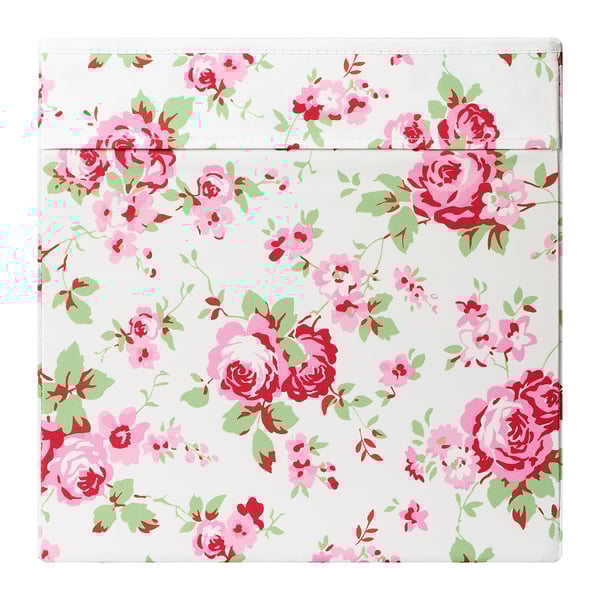 Blumen-Aufbewahrungsbox mit rosa und roten Rosen auf weißem, hochwertigem Stoff, stilvoll und funktional.