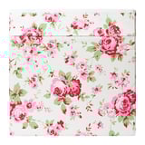 Blumen-Aufbewahrungsbox mit rosa und roten Rosen auf weißem, hochwertigem Stoff, stilvoll und funktional.