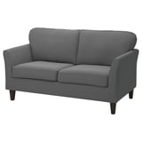 Modernes graues Zweisitzer-Sofa, weicher strukturierter Stoff, Holzbeine, elegante Kissen.