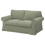 Grünes EKTORP-Sofa, glatter Stoff, gerollte Armlehnen, Rückenkissen.