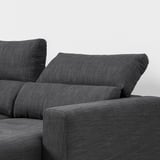 Sofa mit verstellbaren Kopfstützen zur Nackenstütze.