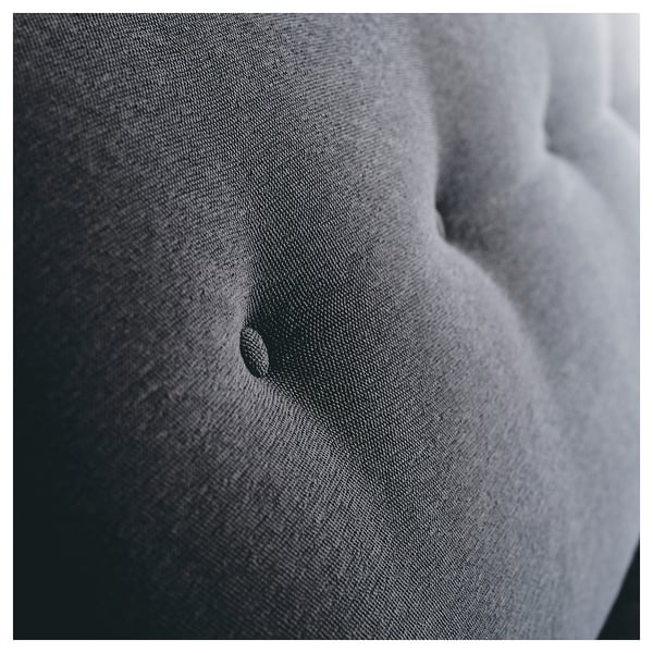 ESSEBODA weiches Sofa aus nächster Nähe, dunkelgrau, strukturierter Stoff, gepolstertes Detail.