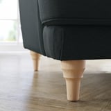 Nahaufnahme der dunkelgrauen ESSEBODA-Sofabeine, helles Holz, weiche Textur.
