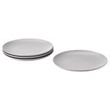 Zwei Platten aus grauem Feinsteinzeug, ein Dreierstapel und ein separates, schlichtes rundes Design.