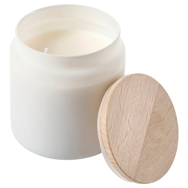FRAMFÄRD weiße Duftkerze mit Holzdeckel. Einfaches, zylindrisches Design aus Glas.