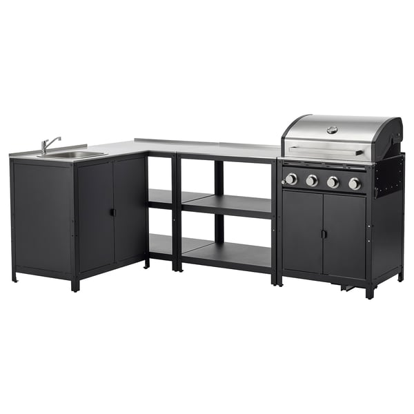 Modernes schwarzes Outdoor-Küchenset mit Spüle, Herd und Grill.