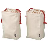 Paar beige GULLRISMOTT beige Stofftaschen mit roten Kordeln zur Aufbewahrung.
