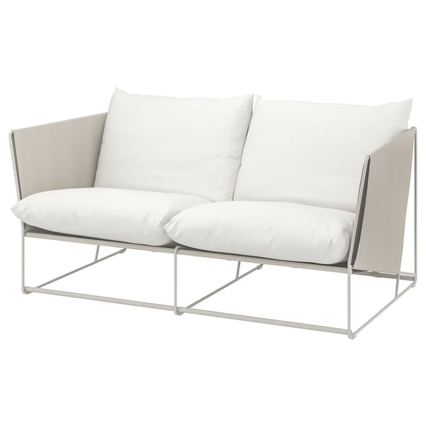 HAVSTEN, weißes Outdoor-Sofa mit Kissen auf Metallrahmen.