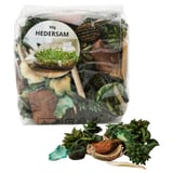 Klarsichtbeutel mit HEDERSAM Potpourri, grüne und braune Pflanzenstücke, 90g, mit kleinem Etikett.