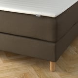 Modernes Bett mit gepolstertem Kopfteil und abnehmbarem, waschbarem Bezug. Unterstützt Lesen oder Fernsehen.