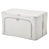 Eine HEMMAFIXARE-Aufbewahrungsbox, cremefarben, mit einem stabilen Rahmen und mehreren Zugangsreißverschlüssen, ideal zum Organisieren von Gegenständen in einem Schrank.