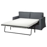 Graues ausziehbares Schlafsofa mit minimalistischem Design, klarem Look und bequemen Kissen.
