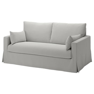 Ein HYLTARP Schlafsofa aus hellgrauem Stoff mit weichem, modernem Design, ideal zum Entspannen und zur einfachen Verwandlung in ein Bett.