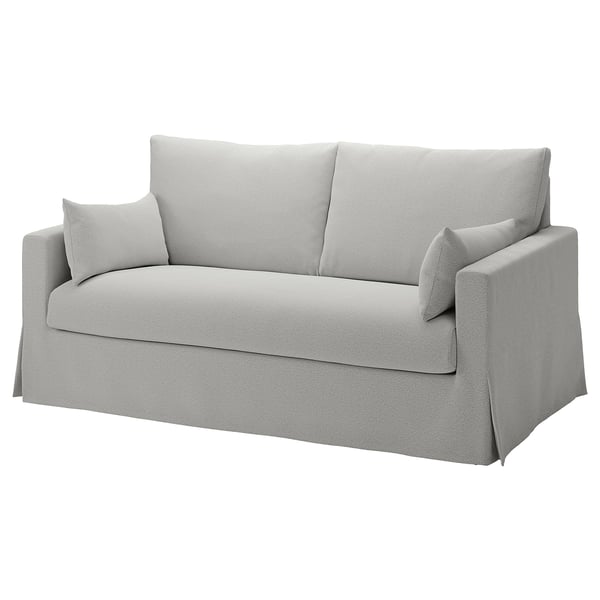 Modernes hellgraues Sofa, klare Linien, zwei Kissen, gepolstert mit einer Mischung aus Baumwolle und Polyester.