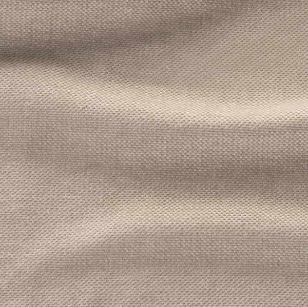 Nahaufnahme von weichem, strukturiertem Stoff, wahrscheinlich Sofabezug, mit dezenten Schattierungen, dargestellt in neutralen Farben.
