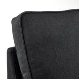 Nahaufnahme eines schwarzen KIVIK-Sofas, das seinen strukturierten Stoff und sein robustes, einladendes Design zeigt.