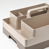 Schreibtisch-Organizer mit mehreren Fächern, robust, beige, Griff oben.