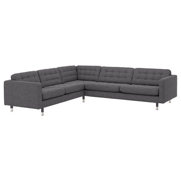 Graues modulares Ecksofa, modernes Design mit getufteten Rückenlehnen und Metallbeinen.