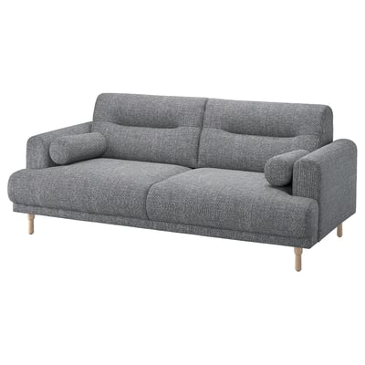 Modernes graues Stoffsofa, weiche runde Formen, helle Eichenbeine, stilvoll und gemütlich.