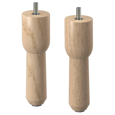 Zwei naturfarbene, abgerundete Holzbeine mit Metallbolzen oben und unten in einem schlichten, minimalistischen Design.