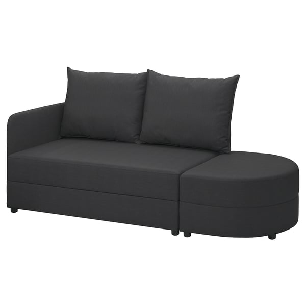 Dunkelgraues LINDÅKRA Schlafsofa mit runden Formen, zwei Rückenkissen und Stauraum in Sitz und Ottomane.