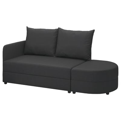 Dunkelgraues LINDÅKRA Schlafsofa mit runden Formen, zwei Rückenkissen und Stauraum in Sitz und Ottomane.