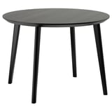 Moderner schwarzer runder Esstisch, vier abgewinkelte Holzbeine, minimalistisches Design.