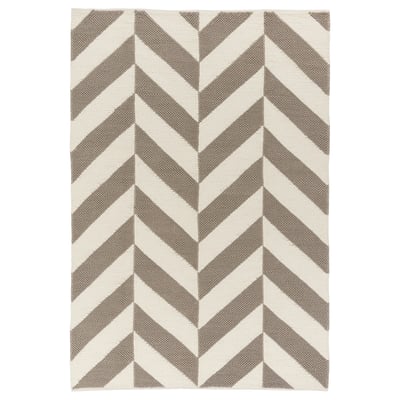 Beigefarbener und grauer Wollteppich mit Chevron-Muster und Baumwollrücken.