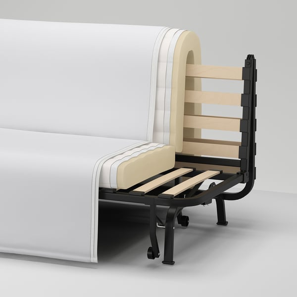 Ecke eines weißen Schlafsofas mit Stahlrahmen, Holzlatten und Stoffbezug.