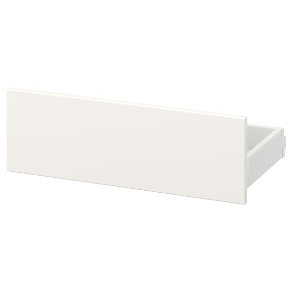 Ein weißer MAXIMERA Schubladenschrank. Es ist rechteckig, mit einer glatten, glatten Oberfläche. Aus Stahl und Spanplatten gefertigt, steht es aufrecht.