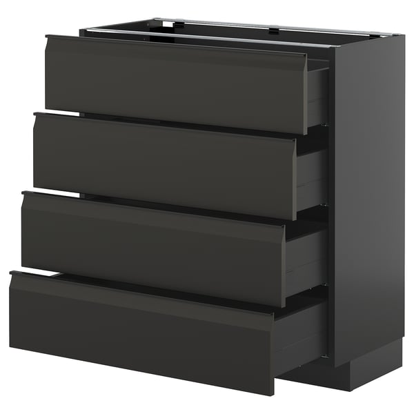 Schwarze Schubladen mit schlanken Griffen.