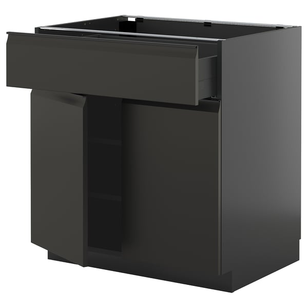 Moderne schwarze Küchenzeile, METOD, mit schlanker Schublade und glattem Schrank, glänzende Oberfläche.