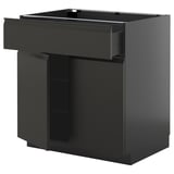 Moderne schwarze Küchenzeile, METOD, mit schlanker Schublade und glattem Schrank, glänzende Oberfläche.