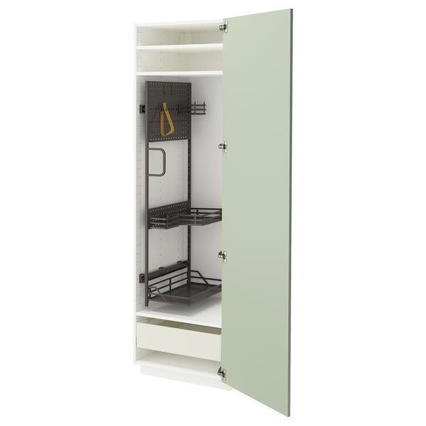 Grüner Küchenschrank mit schwarzen Regalen und Schubladen.