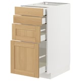 Dieses Bild zeigt einen weißen METOD-Küchenschrank mit vier Schubladen aus Eichenfurnier, der sich durch ein klassisches Design mit abgeschrägten Kanten und einer warmen Holzhaptik auszeichnet.