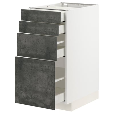 Ein weißer METOD-Küchenschrank mit vier dunkelgrauen Schubladen in Betonoptik mit einem schlanken und modernen Design.