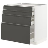 Ein moderner, weißer METOD-Küchenschrank mit vier dunkelgrauen Schubladen mit integrierten Griffen. Das schlanke Design sorgt für eine warme, beruhigende Ästhetik.
