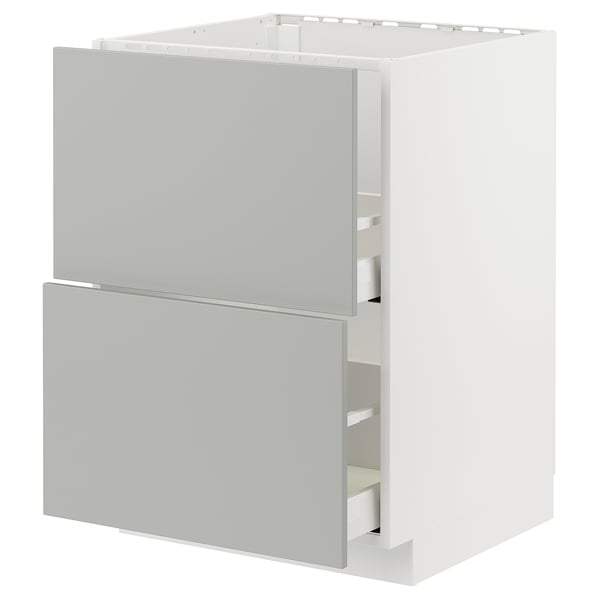 Moderner hellgrauer Küchenschrank mit zwei offenen Schubladen, Teil der METOD-Serie, mit einem schlanken, minimalistischen rechteckigen Design.