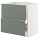 Weißer IKEA METOD Küchenschrank mit 2 graugrünen Schubladen, modernes, minimalistisches Design.