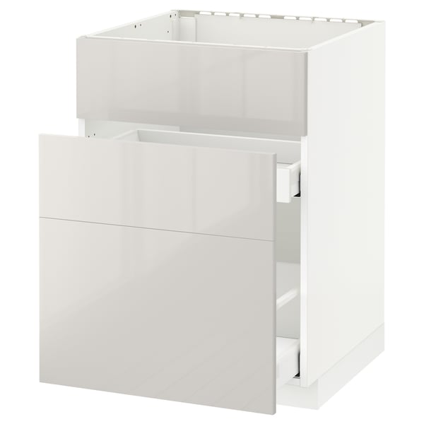 Ein weißer METOD Küchenschrank mit Hochglanz-Finish und leichtgängigen Schubladen.