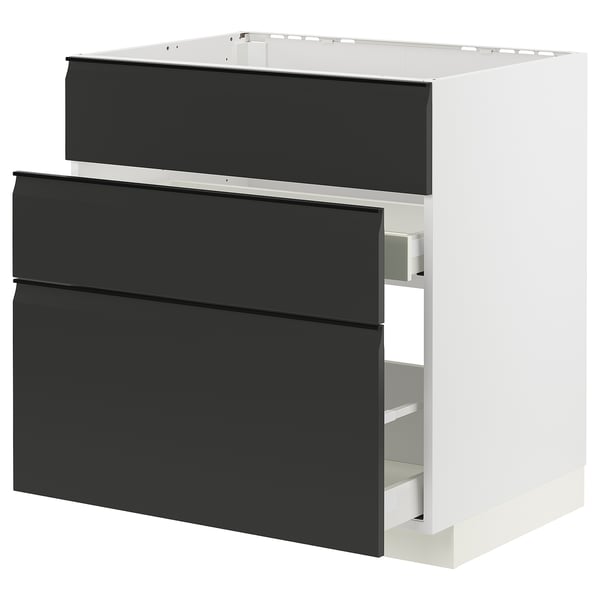 Moderner schwarz-weißer Ikea-Küchenschrank mit schlanken Schubladen.