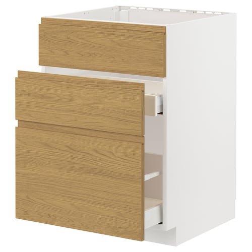 Weißer Schrank aus Holz mit drei Schubladen, Teil des IKEA METOD-Küchensystems.