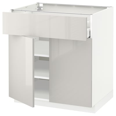 Weißer Küchenschrank mit glänzend grauer Oberfläche, Einzelschublade und offenem Regal. Modernes Design, robust und reinigbar.