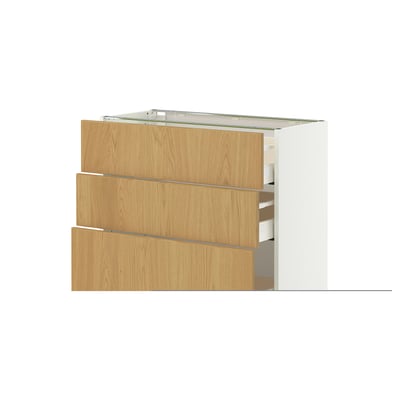Ein weißer METOD-Küchenschrank mit Holzschubladen in heller Eichenausführung. Sichtbar sind drei Schubladen, jede mit einem glatten, verschiebbaren Design.