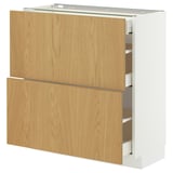 Ein weißer METOD-Küchenschrank mit hellen Holzschubladen. Er verfügt über zwei große Schubladen und ein ausziehbares Regal.
