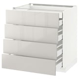 Weißer IKEA METOD Küchenschrank mit vier ausziehbaren Schubladen, glänzende Oberfläche.