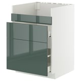 Moderner Küchenschrank in glänzendem Graugrün mit drei Schubladen, schlankem Design, glatten Schubladen.