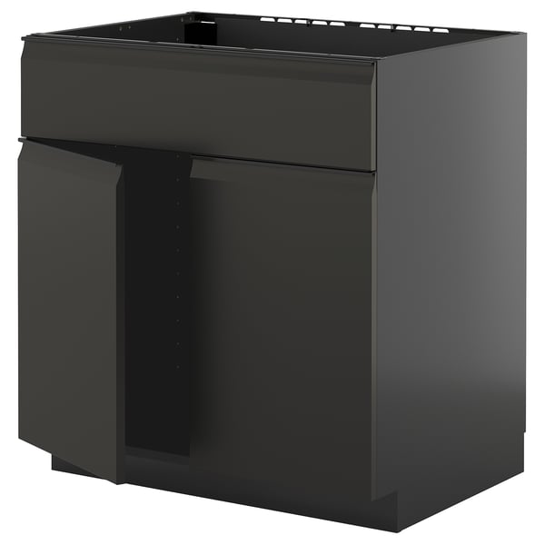 Moderner schwarzer Küchenschrank, quadratisch, mit klaren Linien und schlankem Design.